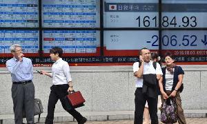 Tokyo shares slip as strong Yen hits exporters
